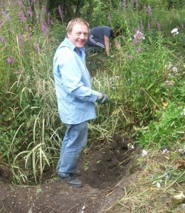 Mark digging out the pond, regularly overgrown